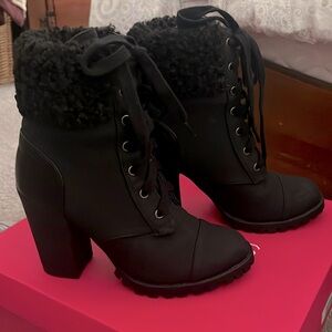 Women’s Shoedazzle Size 7 High heel bootie w Sherpa . Can ship in original box.